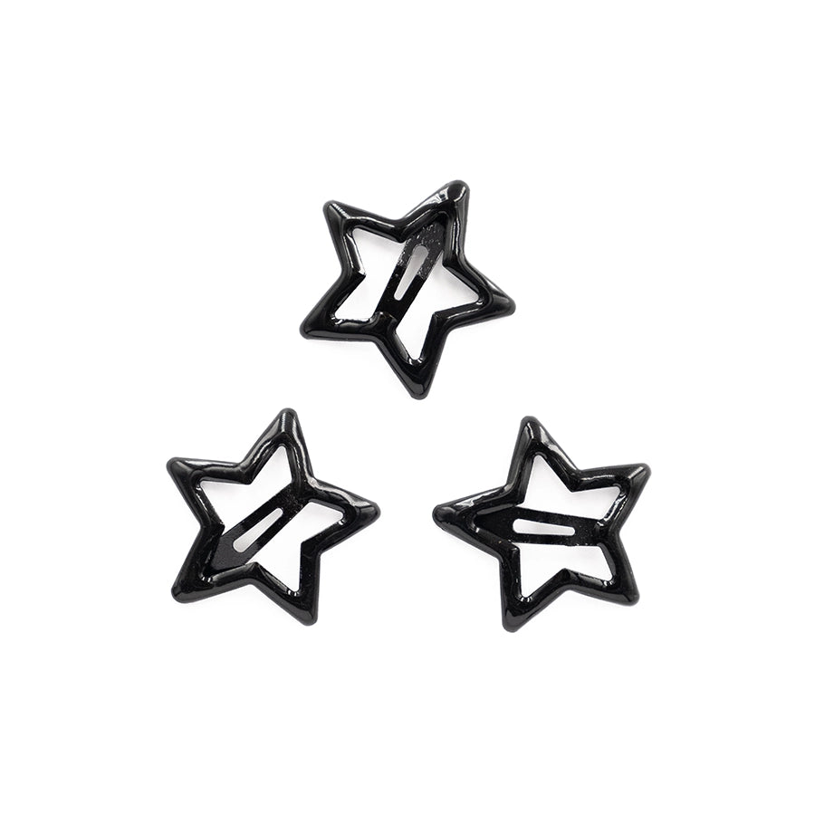 Den sorte stjerne hårspænde starry på hvid baggrund